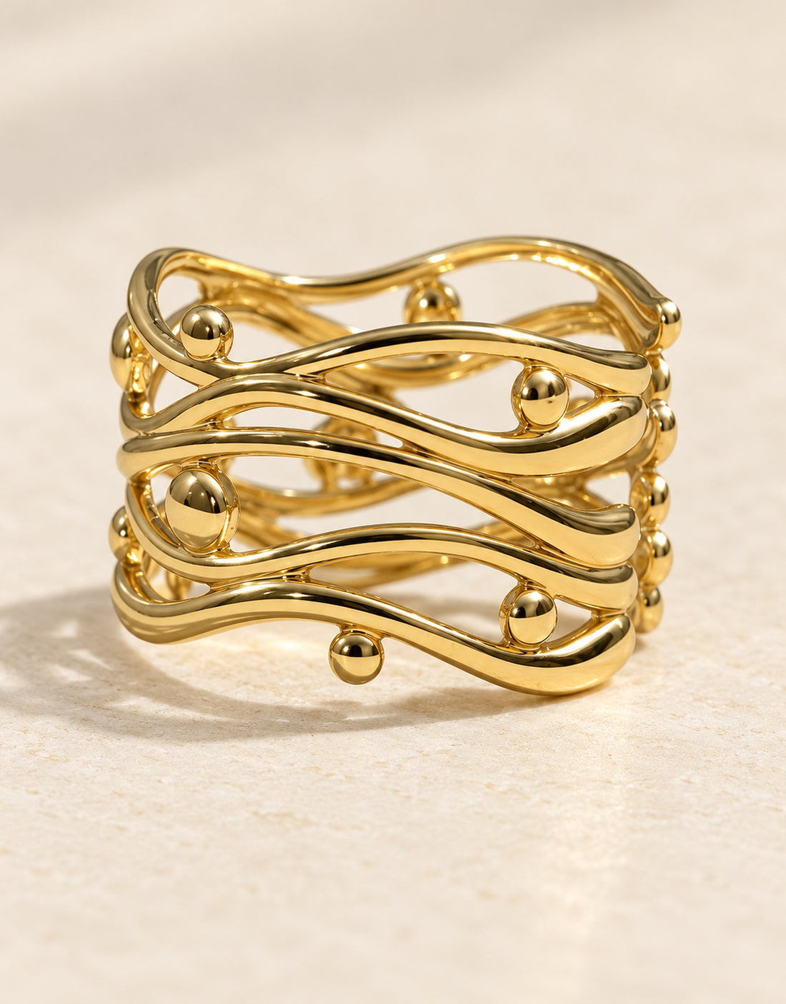 Orneza Gold-Tone Wavy Lattice Wide Ring — detail view
