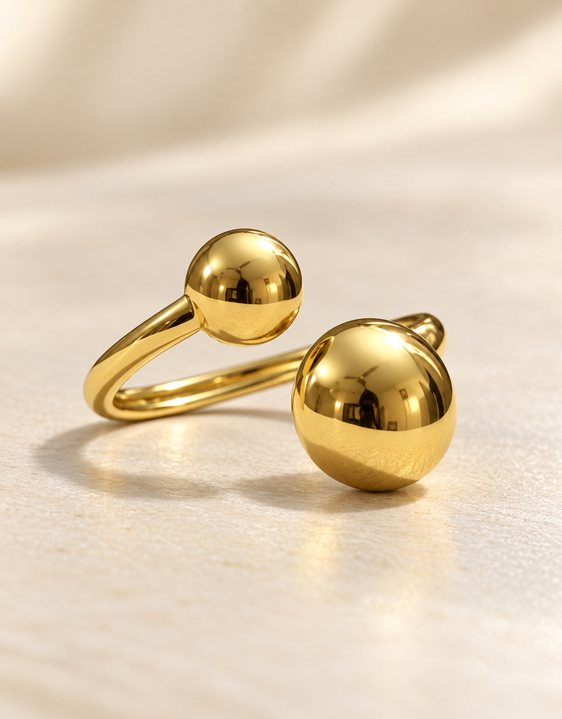Orneza Gold-Tone Open Twin Ball Ring — detail view