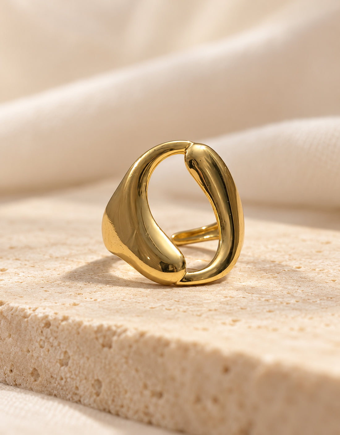 Orneza Gold-Tone Sculptural Open Loop Ring — styled view