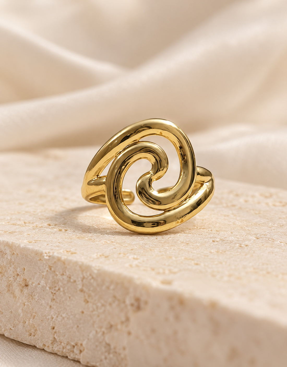 Orneza Gold-Tone Swirl Front Ring — styled view