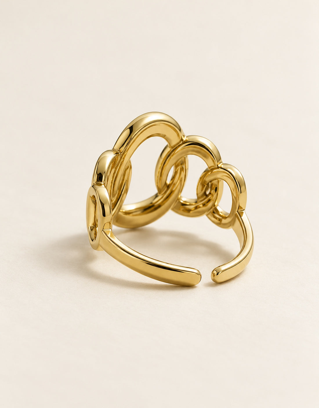 Orneza Gold-Tone Linked Loop Ring — angle view