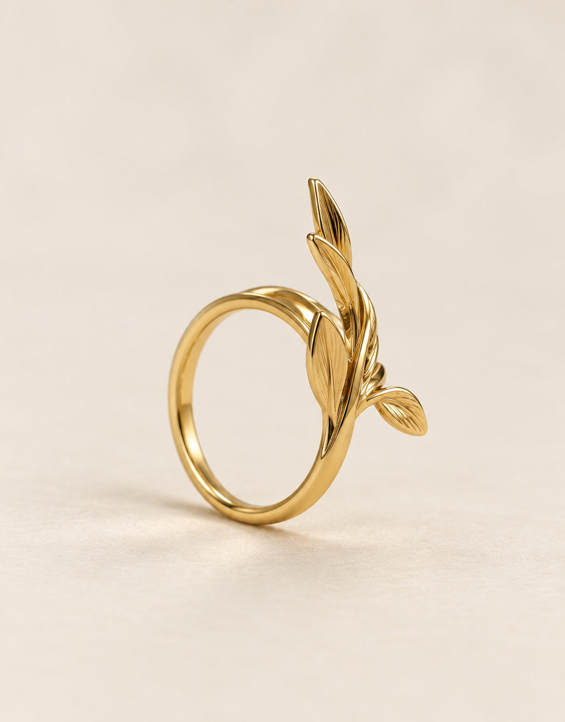 Orneza Gold-Tone Branching Leaf Wrap Ring — angle view