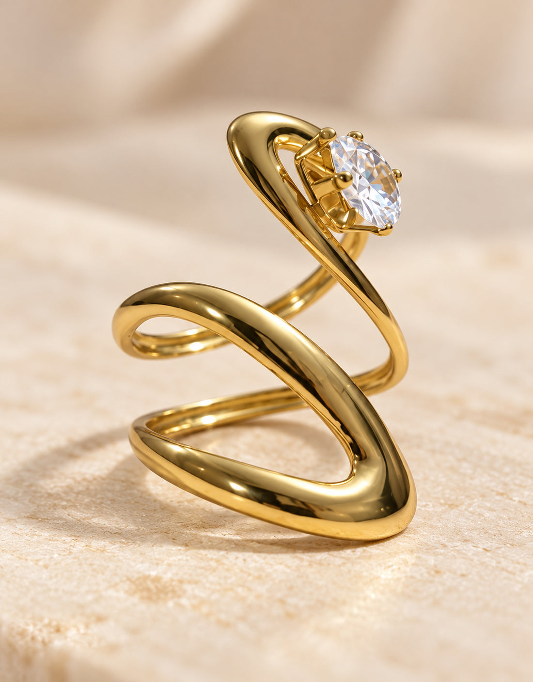 Orneza Gold-Tone S-Curve Clear Stone Ring — detail view