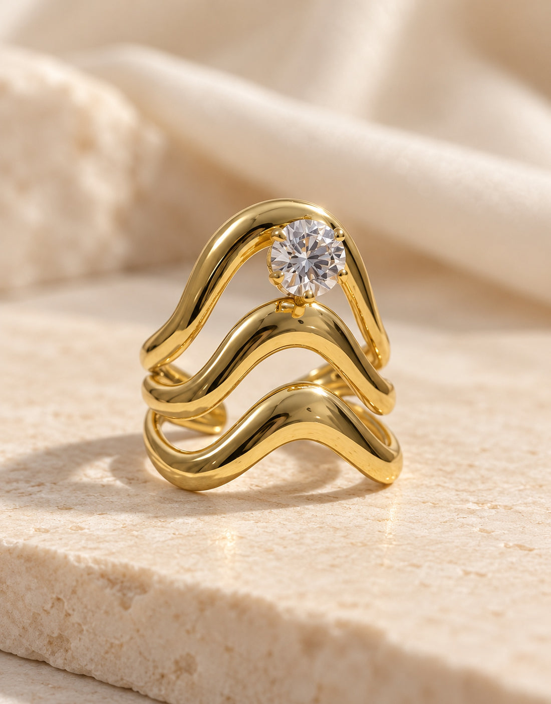 Orneza Gold-Tone Wavy Stacked Clear Stone Ring — styled view