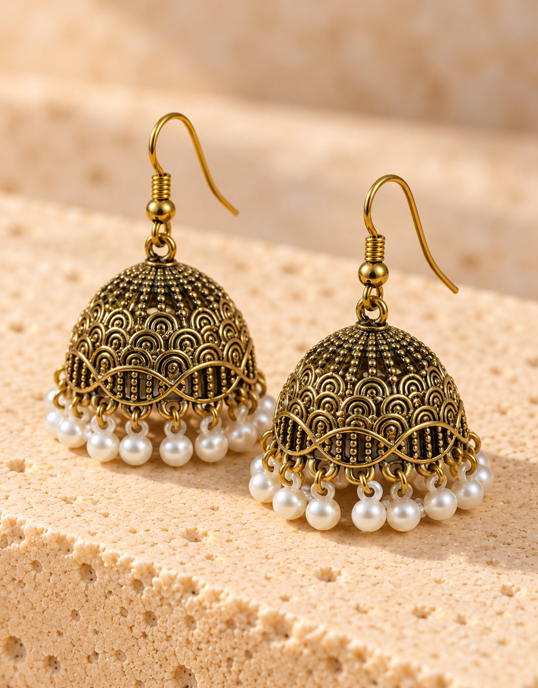 Orneza Antique Gold-Tone Scallop Pattern Jhumka Earrings with Pearls — angle view