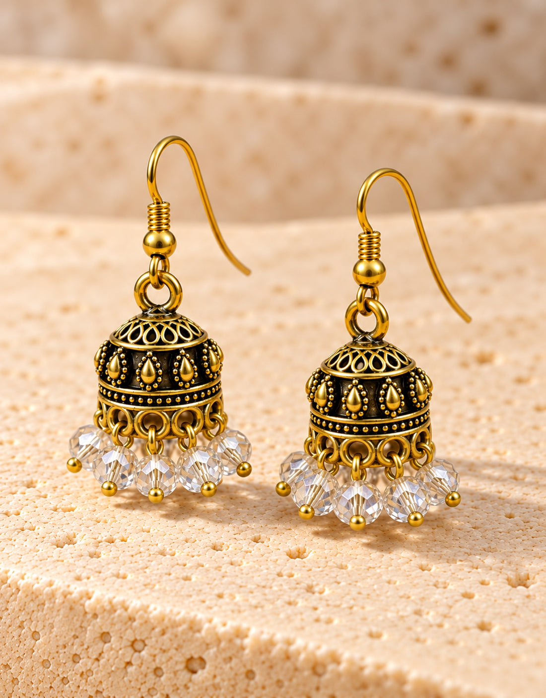 Orneza Antique Gold-Tone Mini Jhumka Earrings with Clear Crystal Beads — angle view