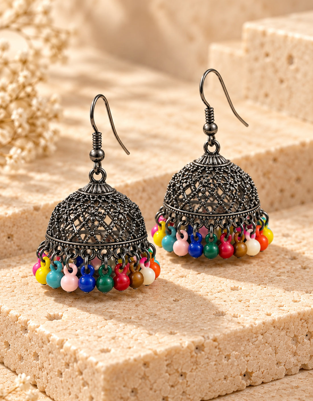 Orneza Oxidised Filigree Jhumka Earrings with Multicolour Beads — angle view