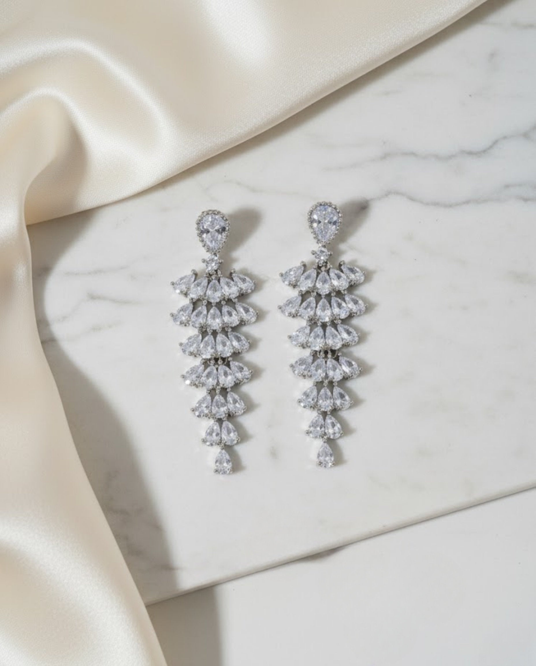 Orneza Silver Majestic Pear Drop Zirconia Chandelier Earrings