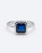 Orneza Royal Blue Sapphire Square Solitaire Silver Ring