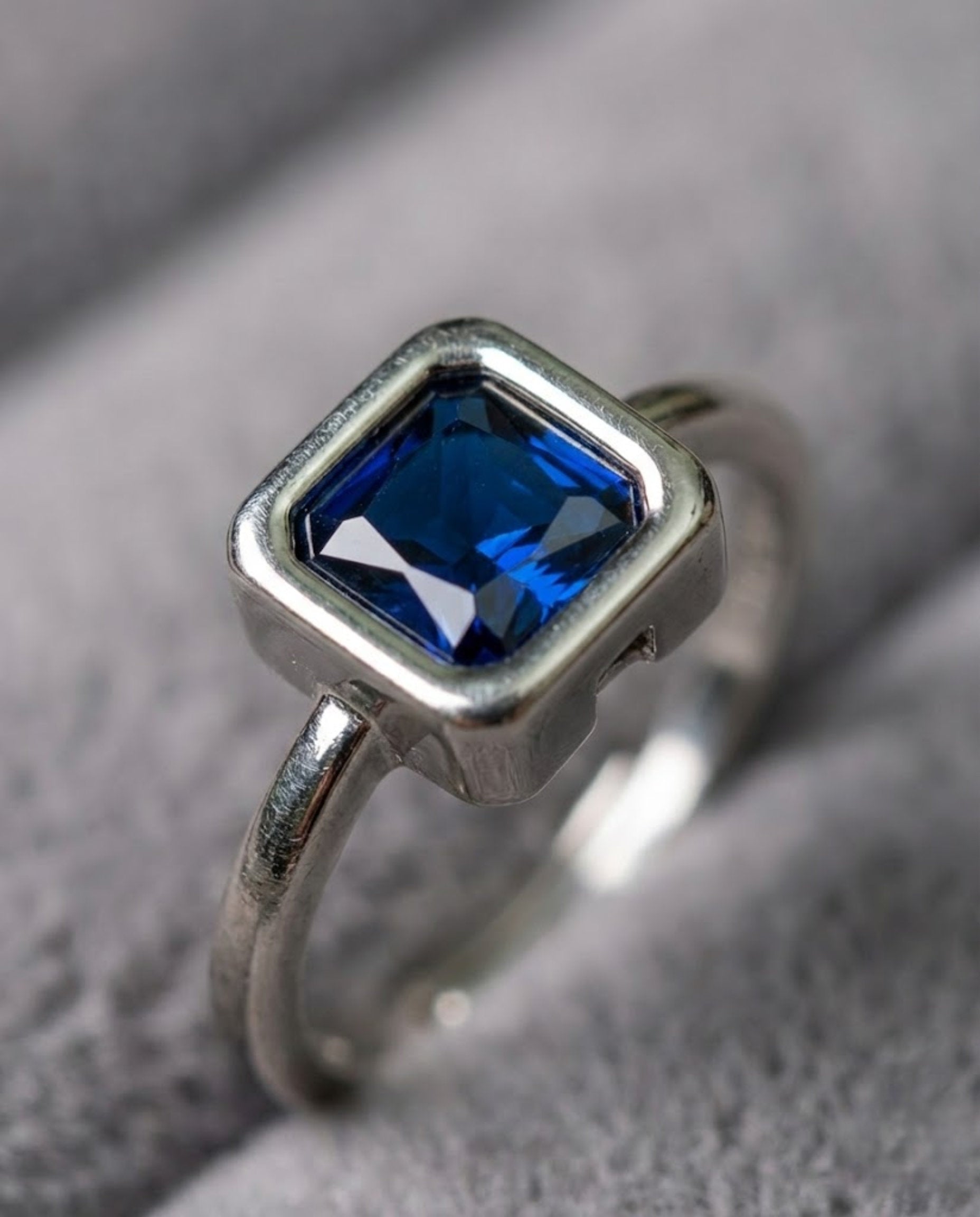 Orneza Royal Blue Sapphire Square Solitaire Silver Ring