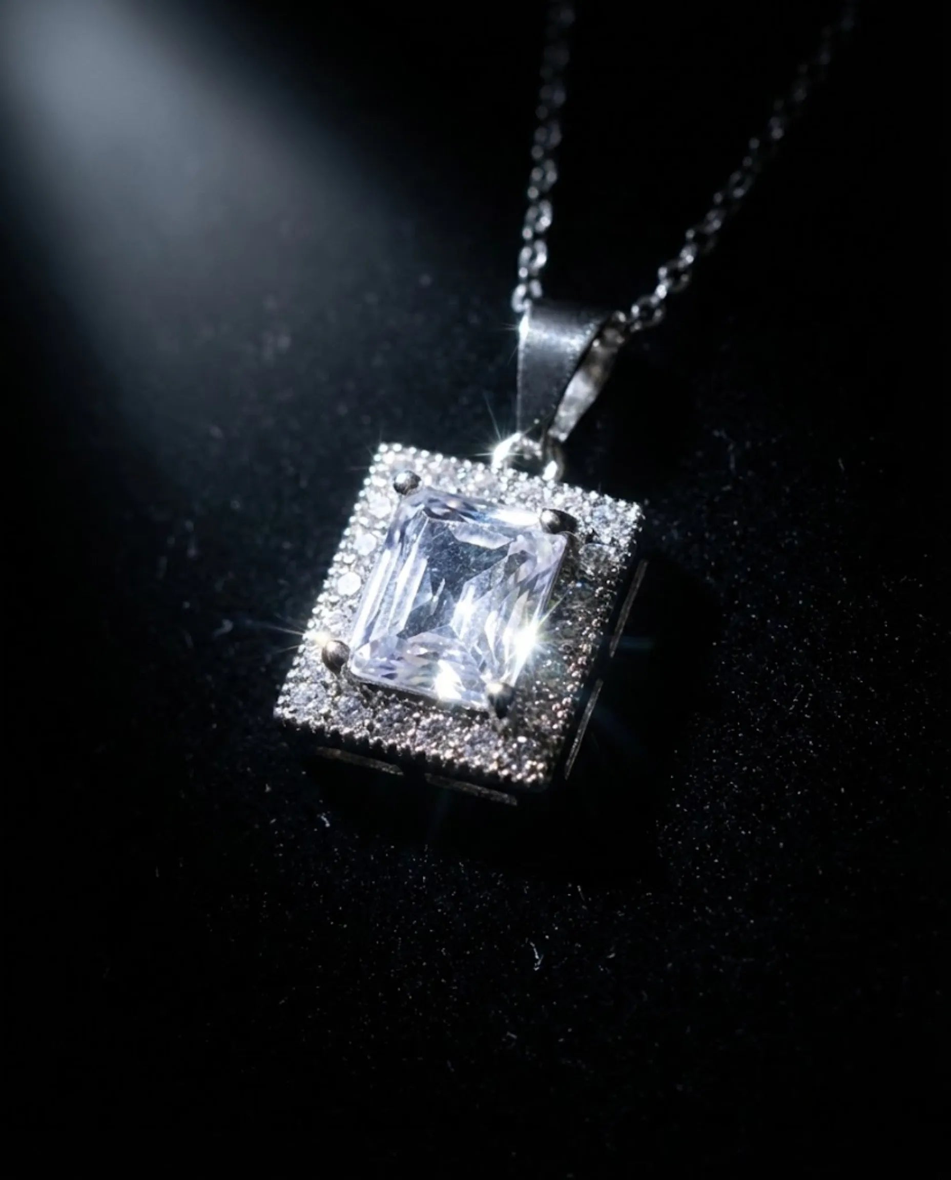 Orneza Silver Emerald Cut Zircon Halo Pendant Necklace