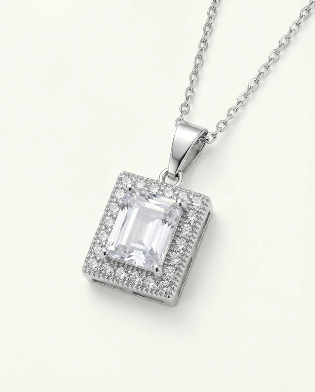Orneza Silver Emerald Cut Zircon Halo Pendant Necklace