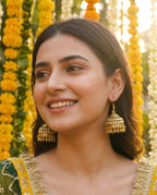 Orneza Antique Gold Textured Jhumka Earrings