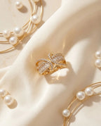 Orneza Gilded Bow Baguette Crystal Statement Ring