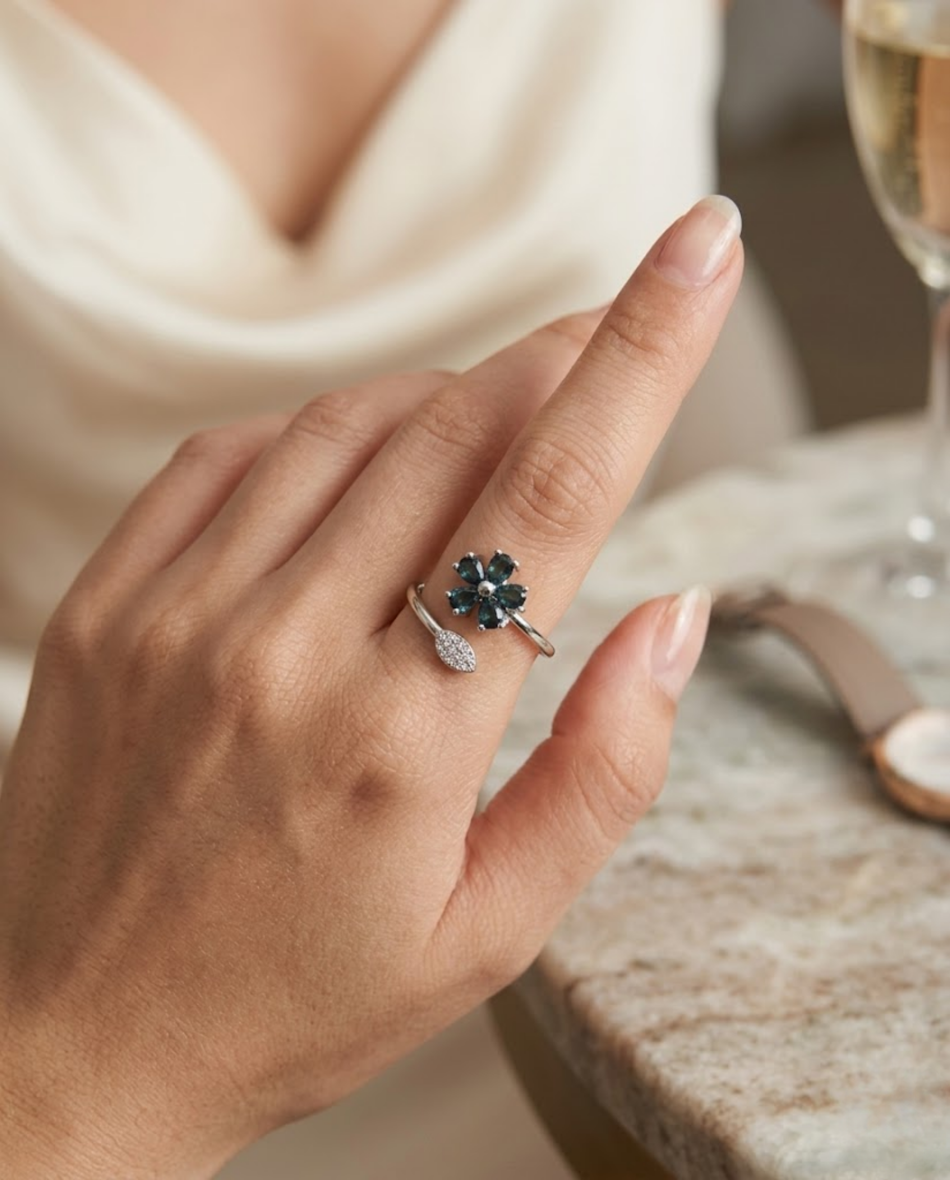 Orneza Sapphire Blue Floral Wrap Ring in Silver