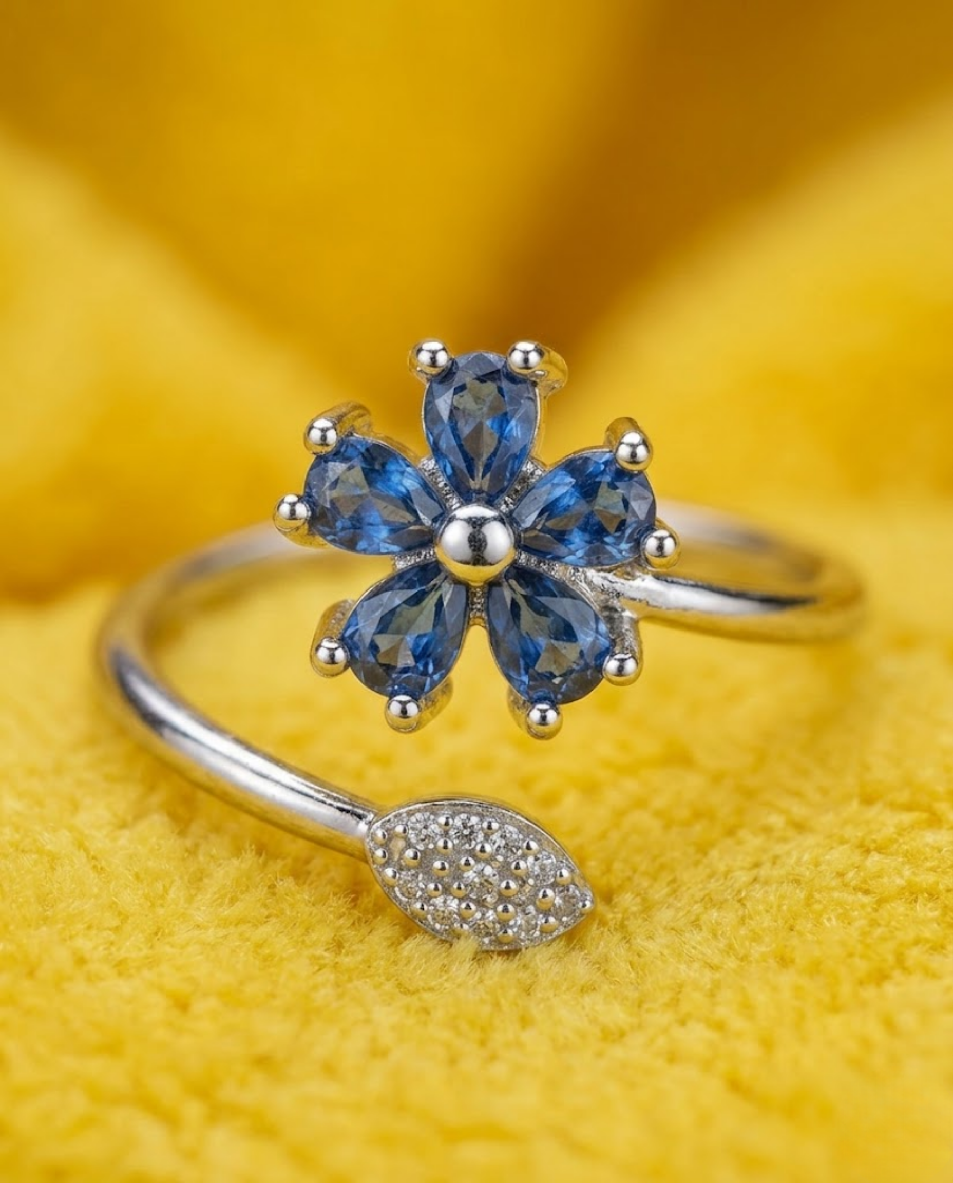 Orneza Sapphire Blue Floral Wrap Ring in Silver