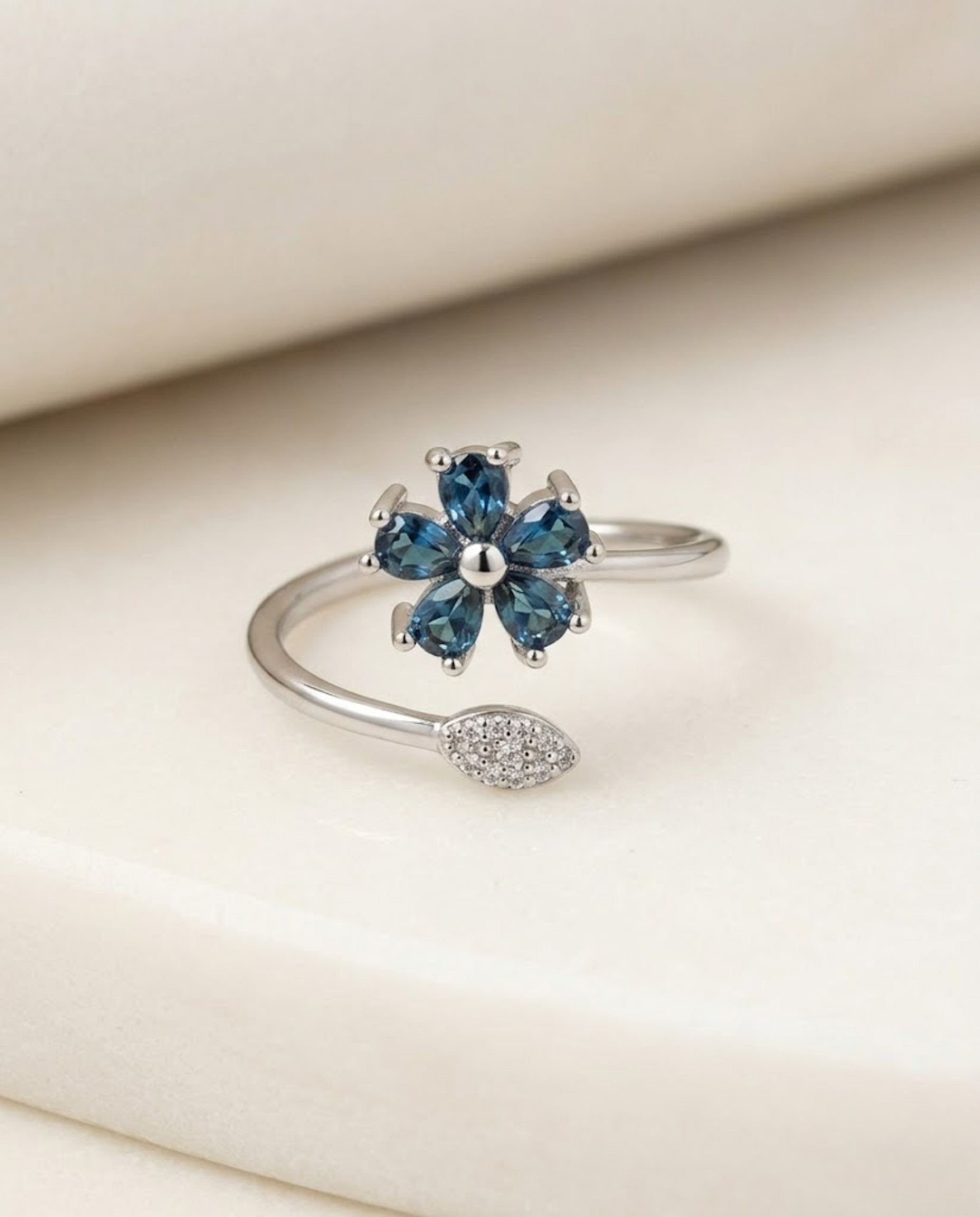 Orneza Sapphire Blue Floral Wrap Ring in Silver