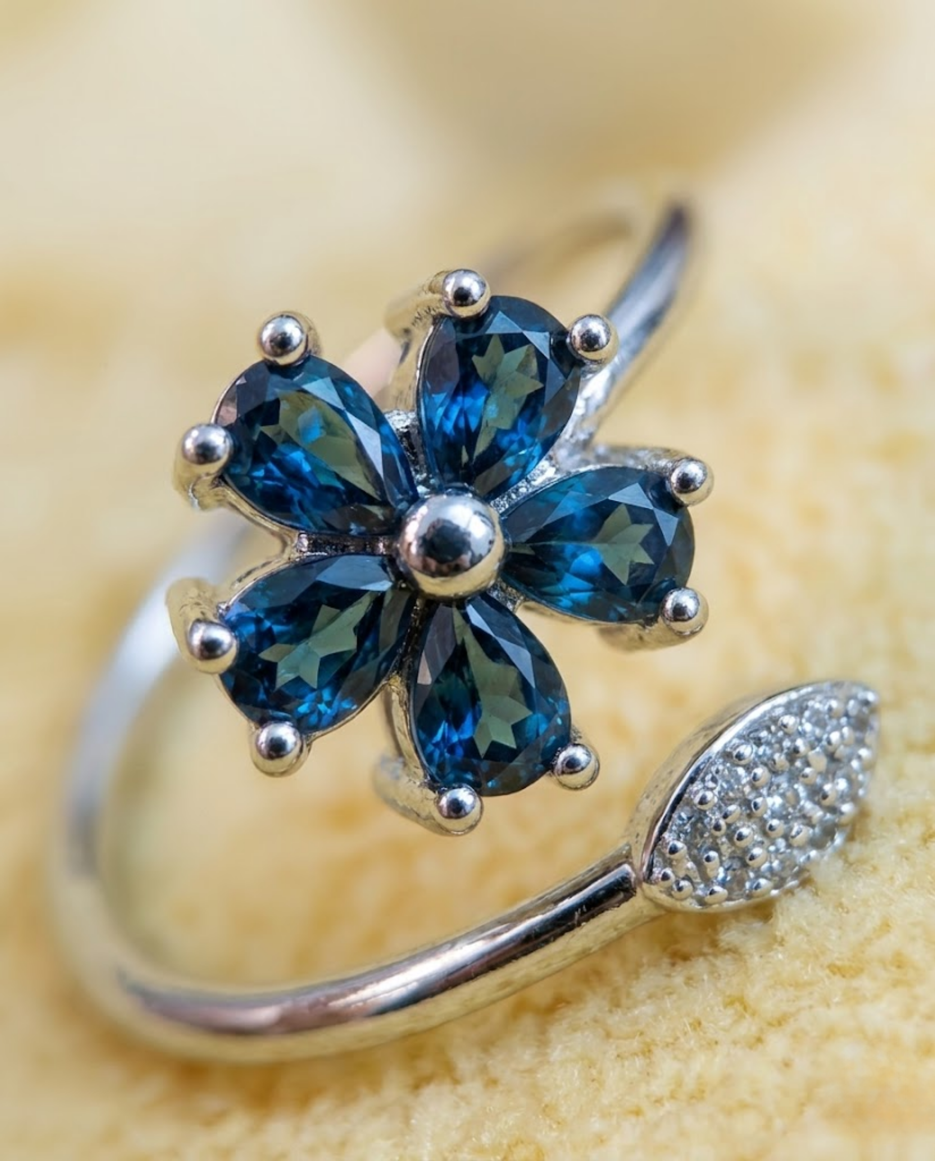 Orneza Sapphire Blue Floral Wrap Ring in Silver