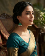 Orneza Emerald Green Textured Jhumka Earrings with Pearls