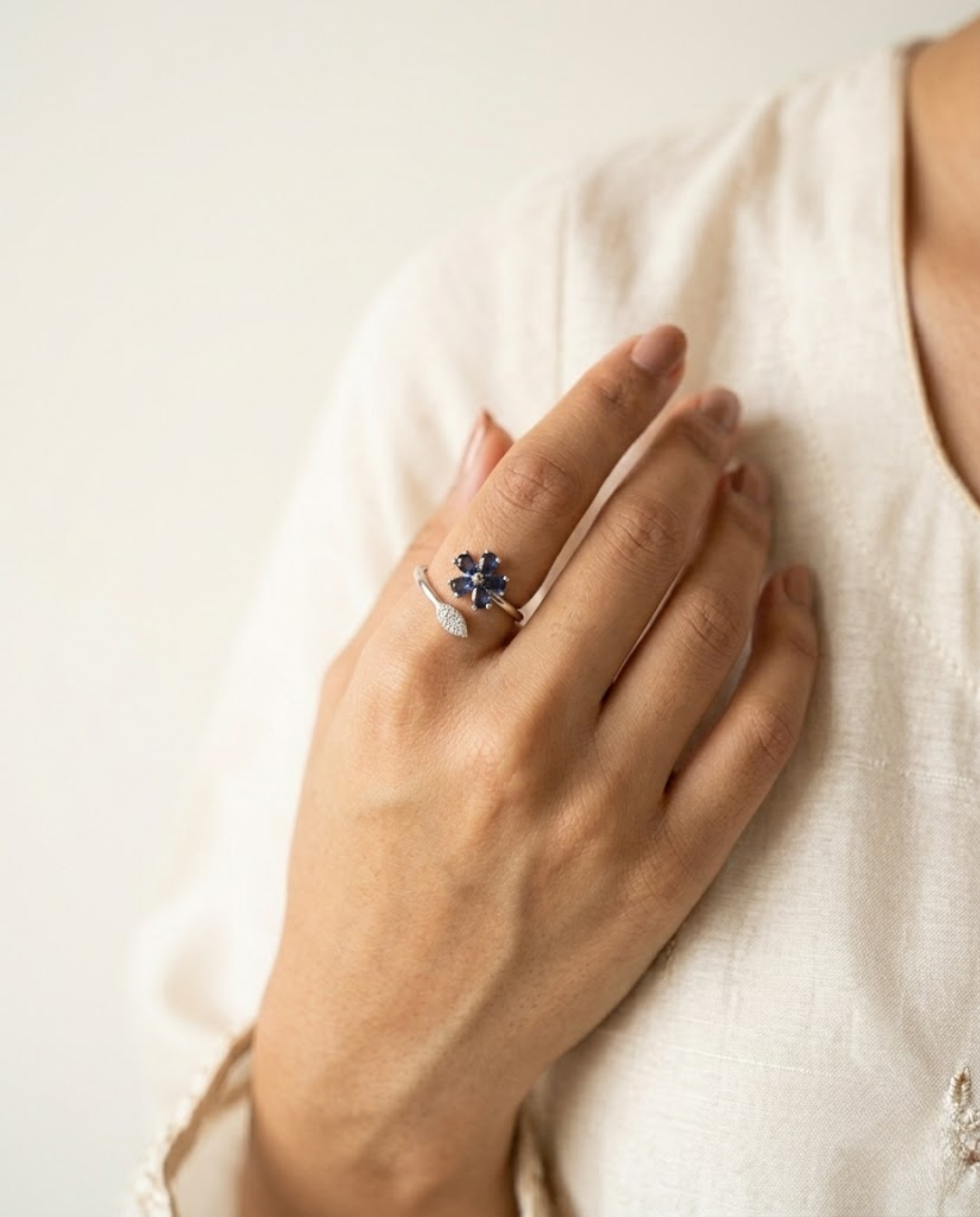 Orneza Sapphire Blue Floral Wrap Ring in Silver