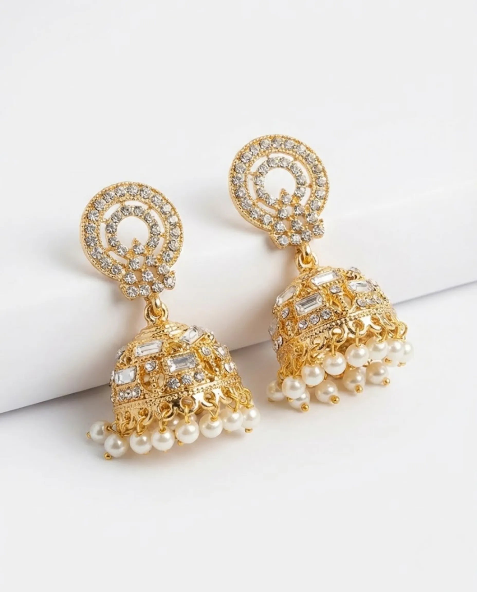 Orneza Gold Zircon Studded Jhumka Earrings with Pearls