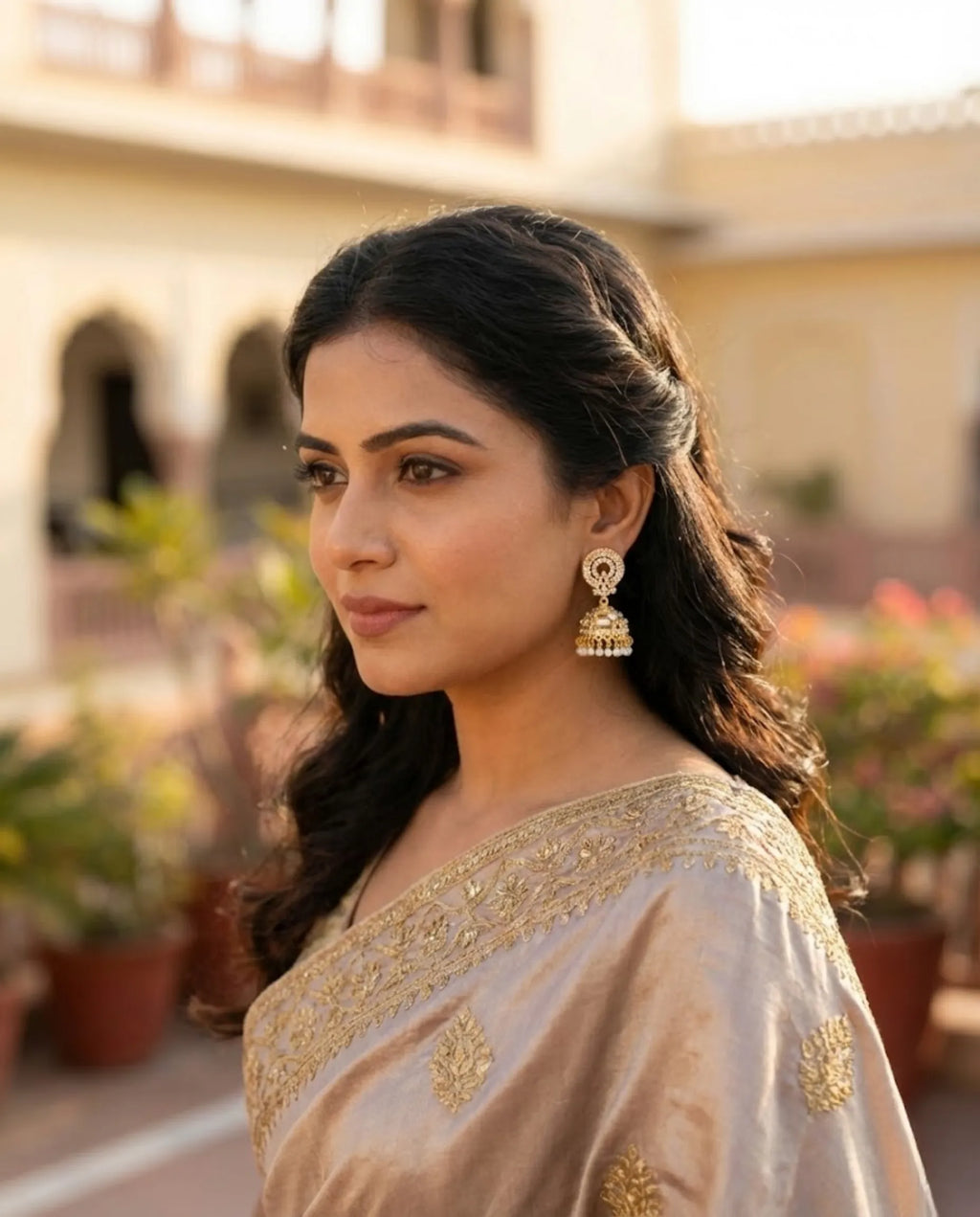 Orneza Gold Zircon Studded Jhumka Earrings with Pearls