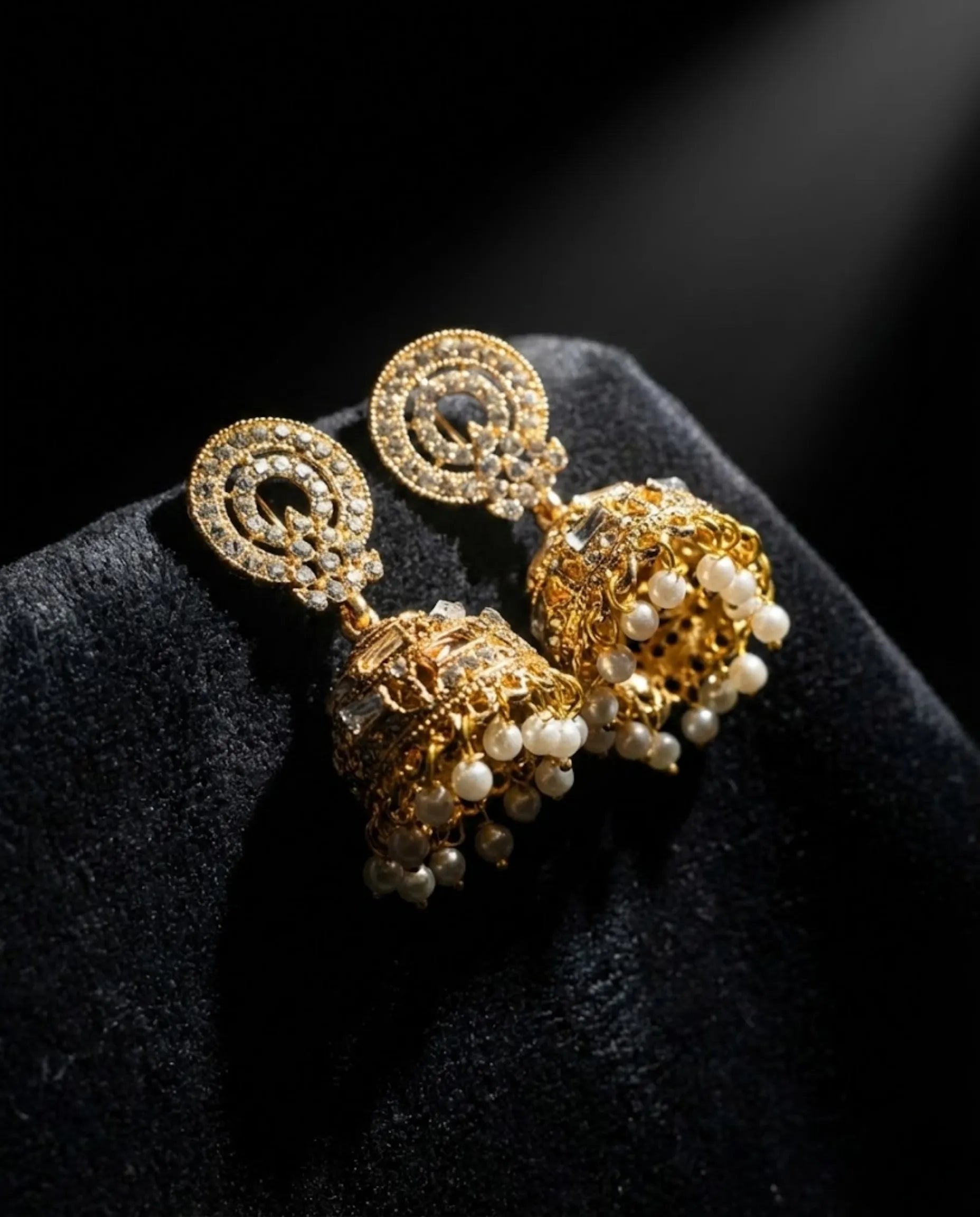 Orneza Gold Zircon Studded Jhumka Earrings with Pearls