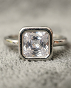 Orneza Princess Cut Bezel Set Sterling Silver Ring