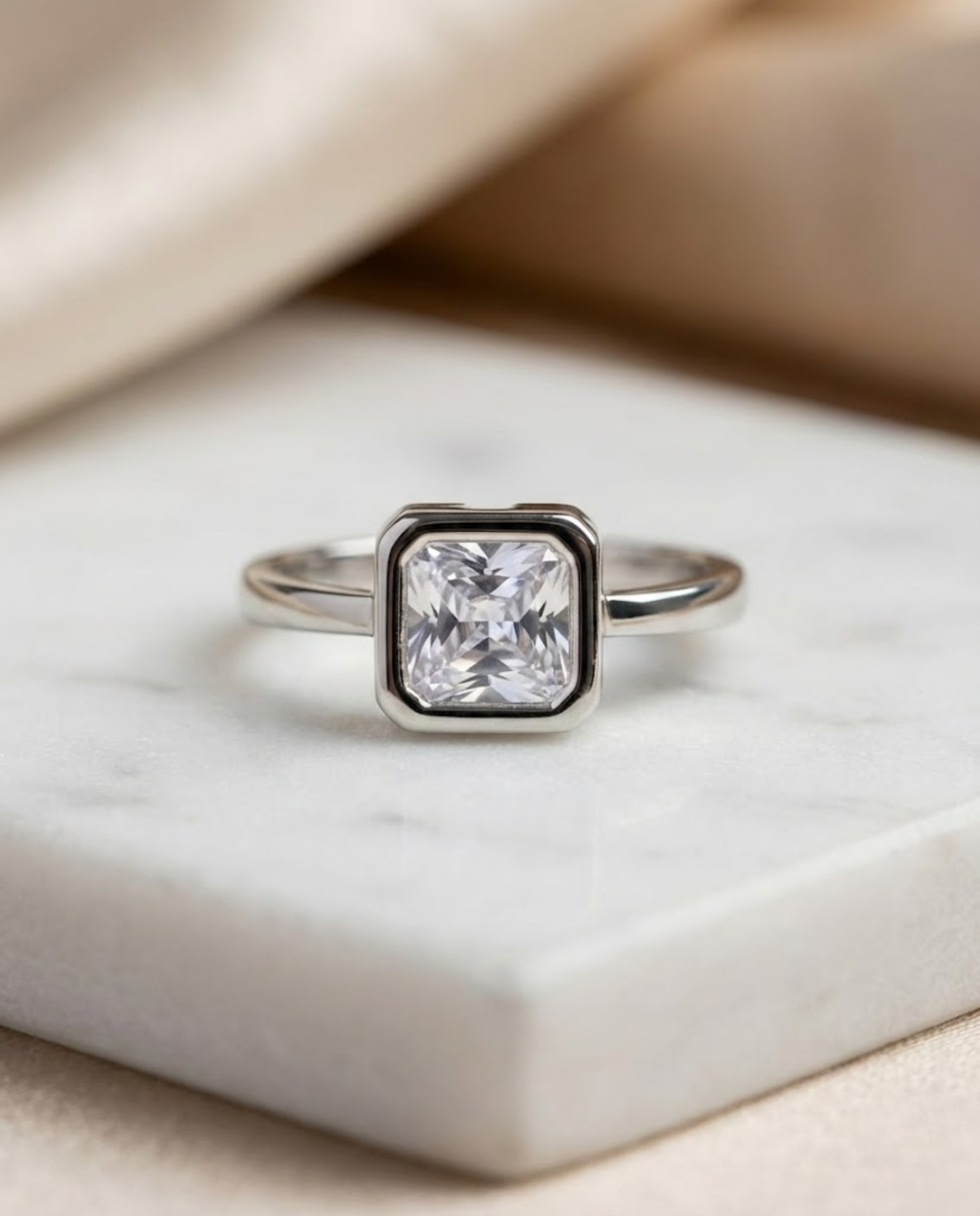Orneza Princess Cut Bezel Set Sterling Silver Ring