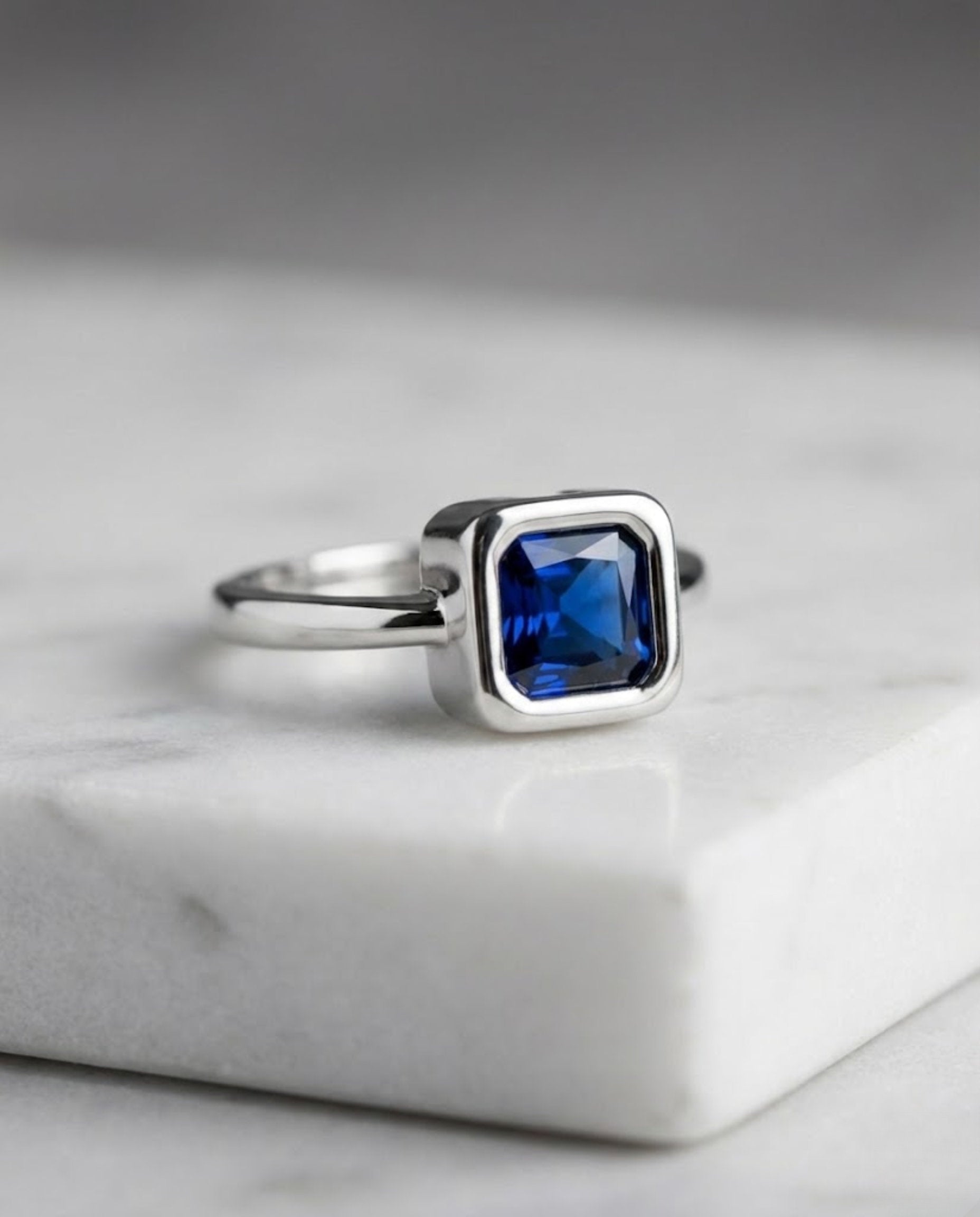 Orneza Royal Blue Sapphire Square Solitaire Silver Ring