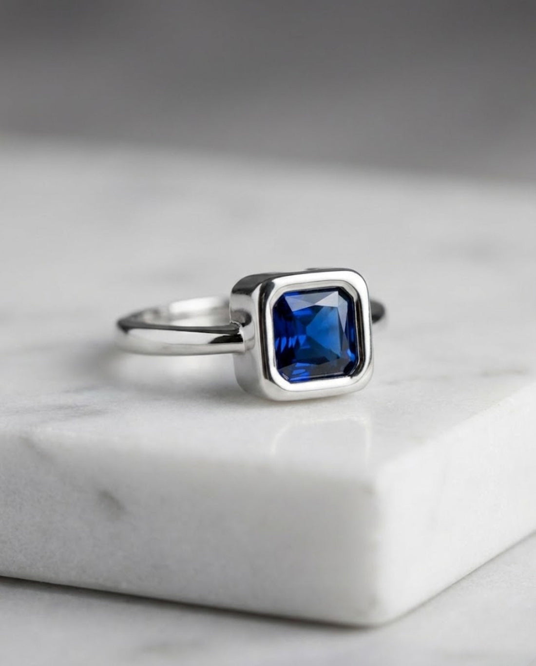 Orneza Royal Blue Sapphire Square Solitaire Silver Ring