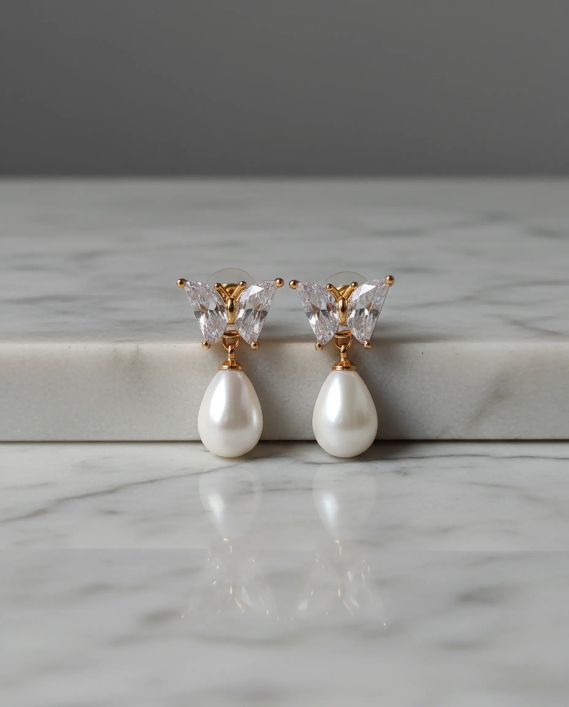 Orneza Crystal Butterfly Gold Drop Earrings with Teardrop Pearl