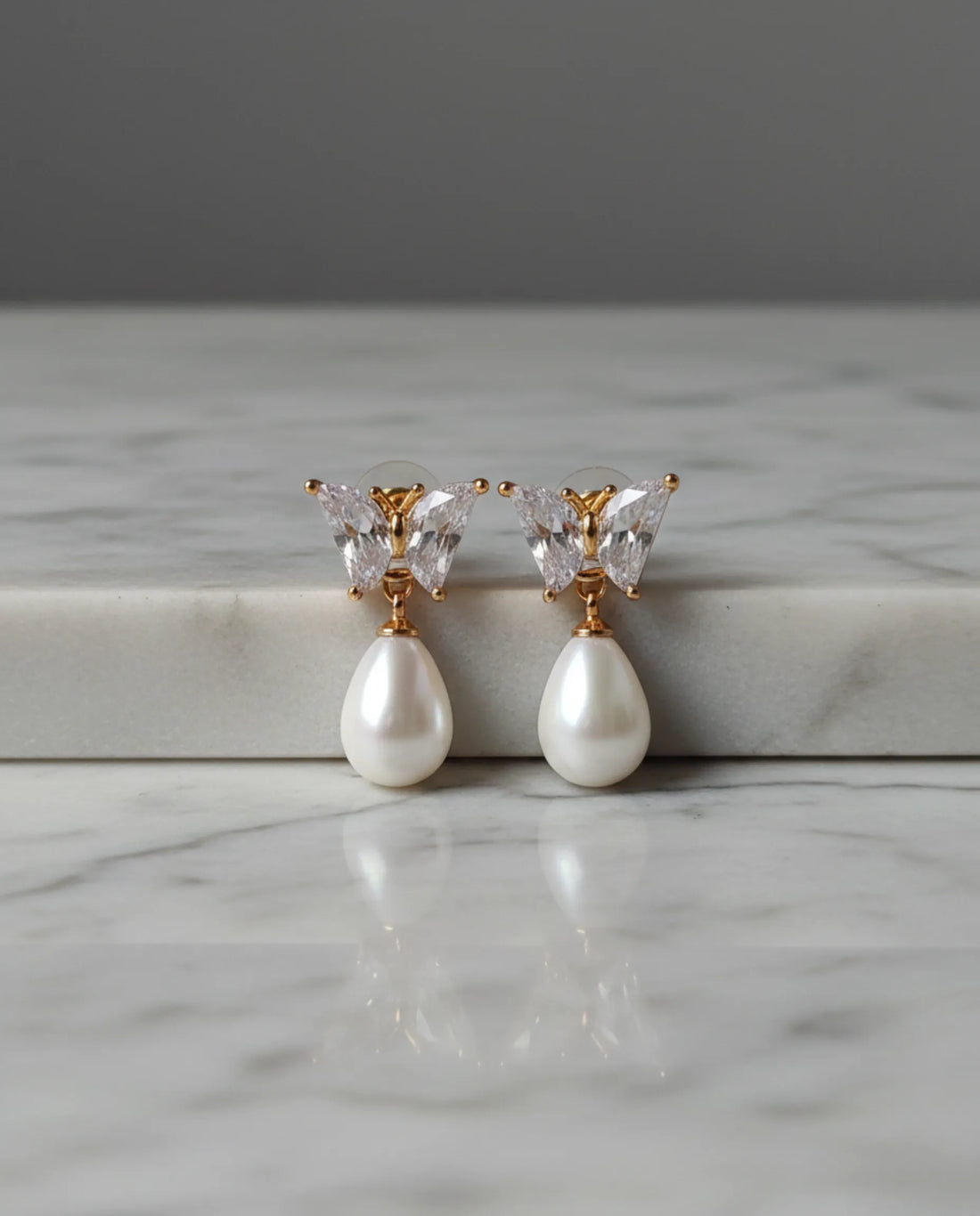 Orneza Crystal Butterfly Gold Drop Earrings with Teardrop Pearl
