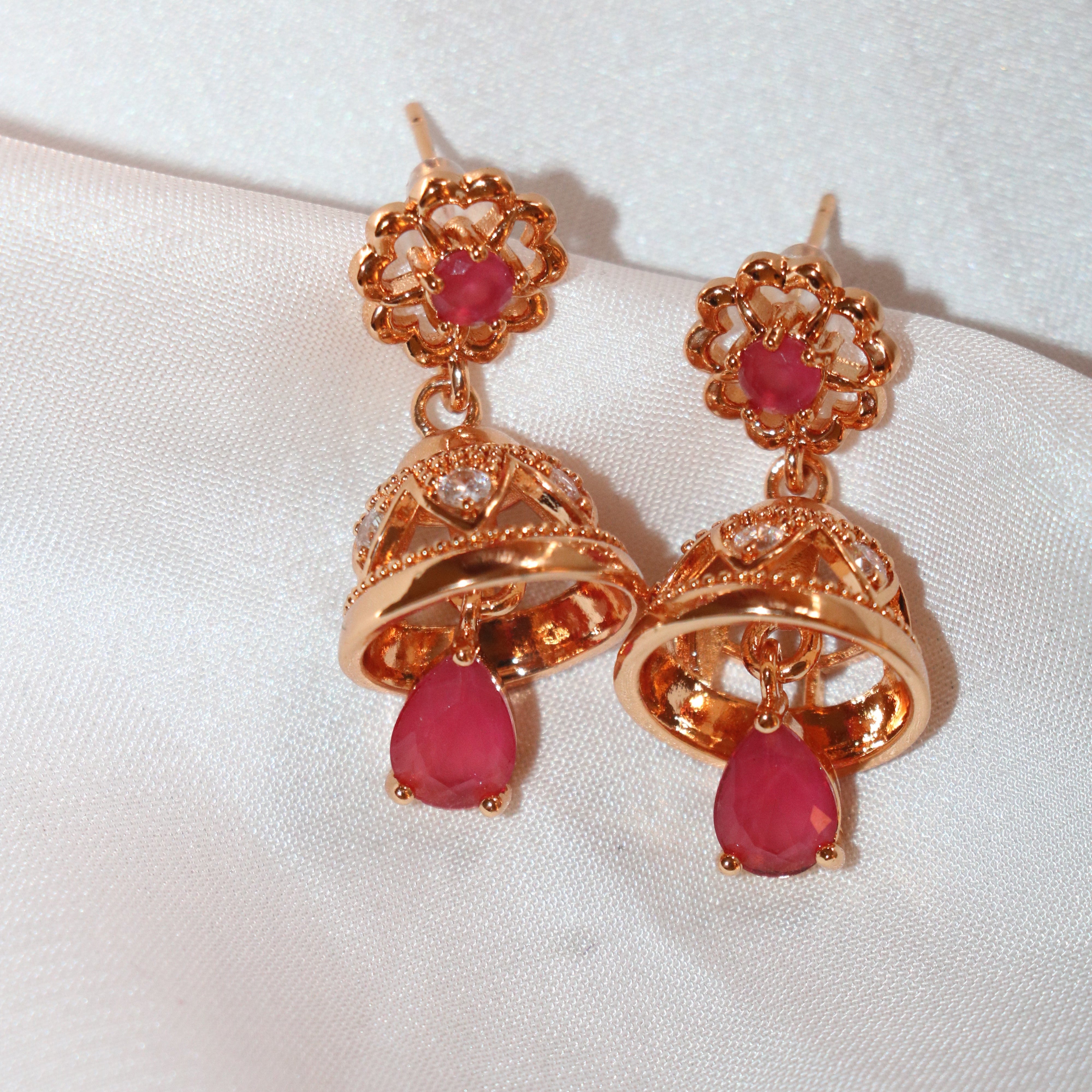 Gold-Plated Floral Jhumka Earrings with Ruby Red Accents – A Blend of Tradition and Elegance