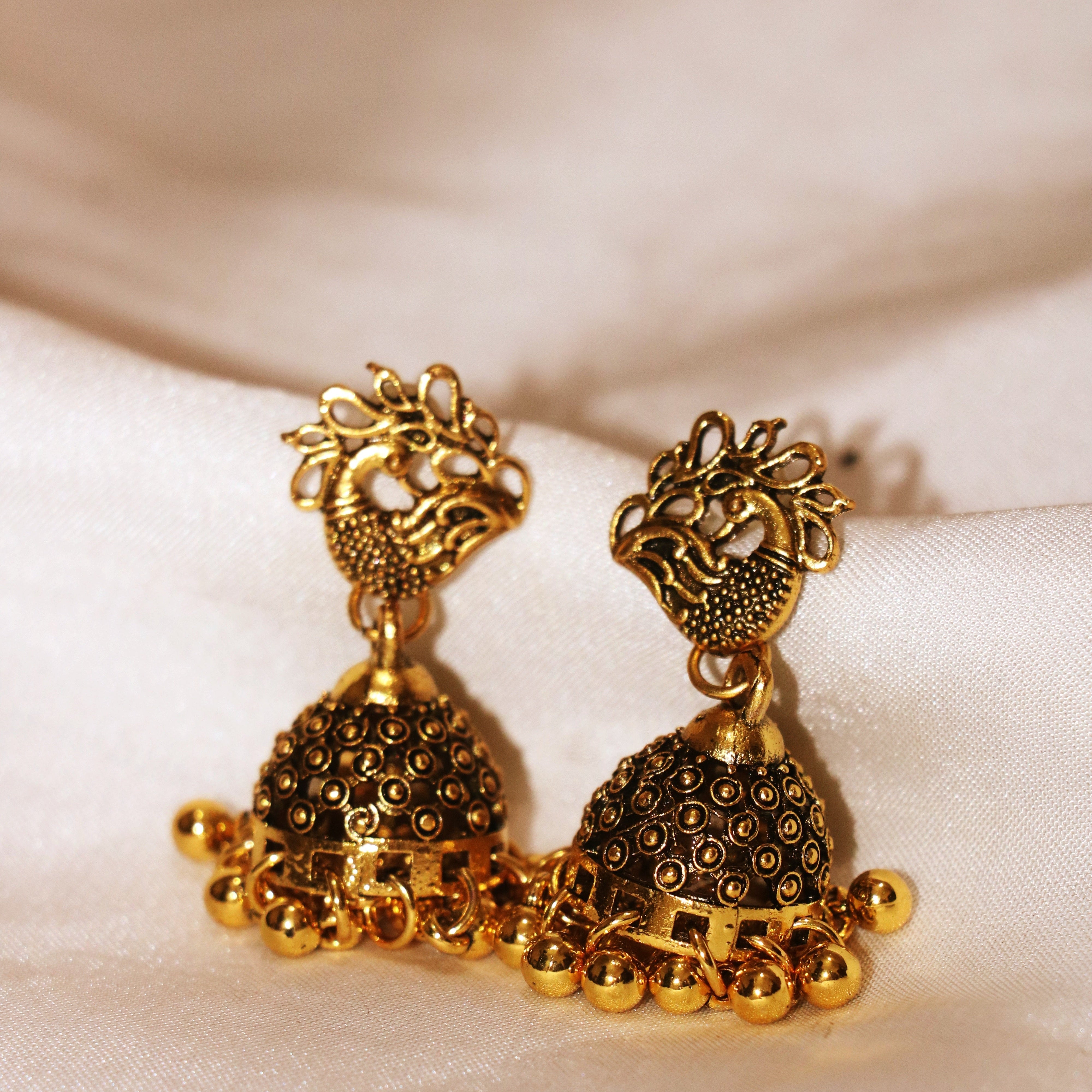 Golden Peacock Jhumka Earrings – Traditional Elegance Redefined