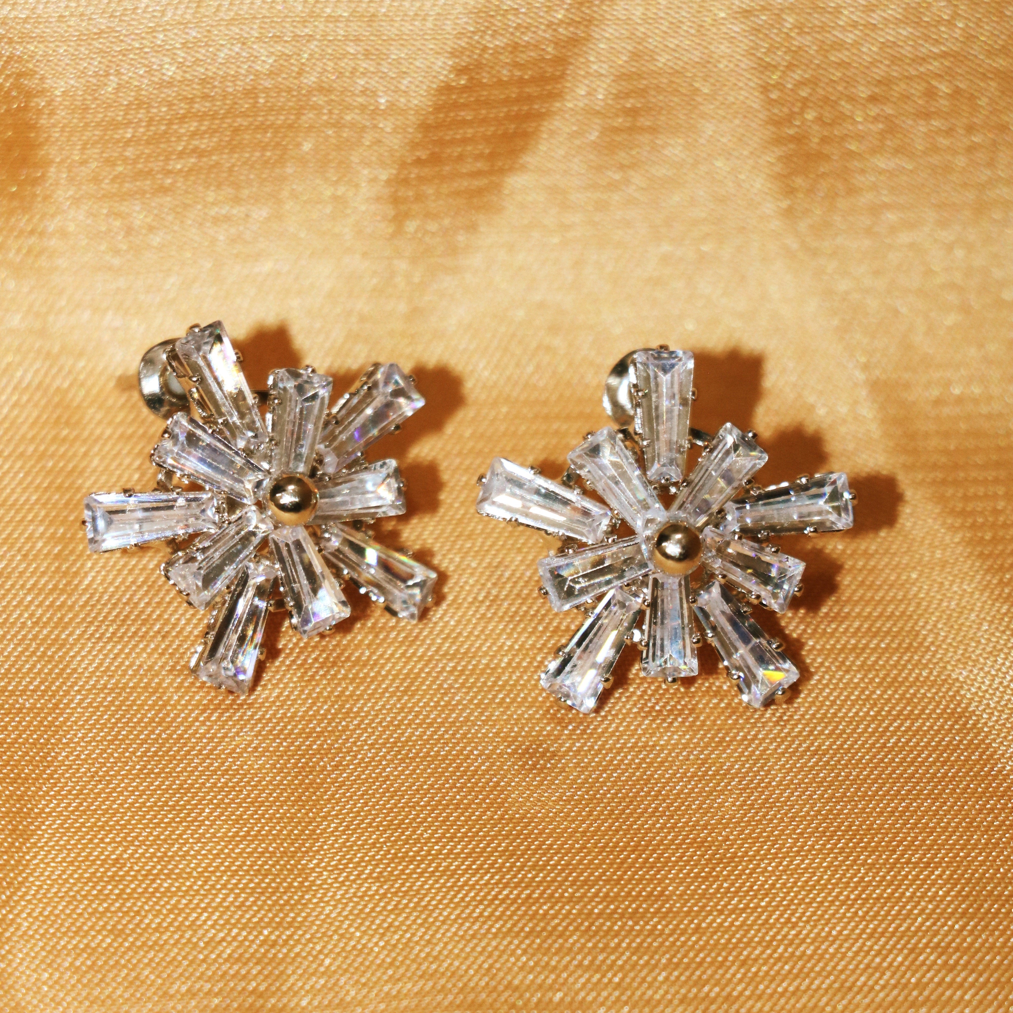 Radiant Starburst Stud Earrings – Dazzle with Elegance and Shine