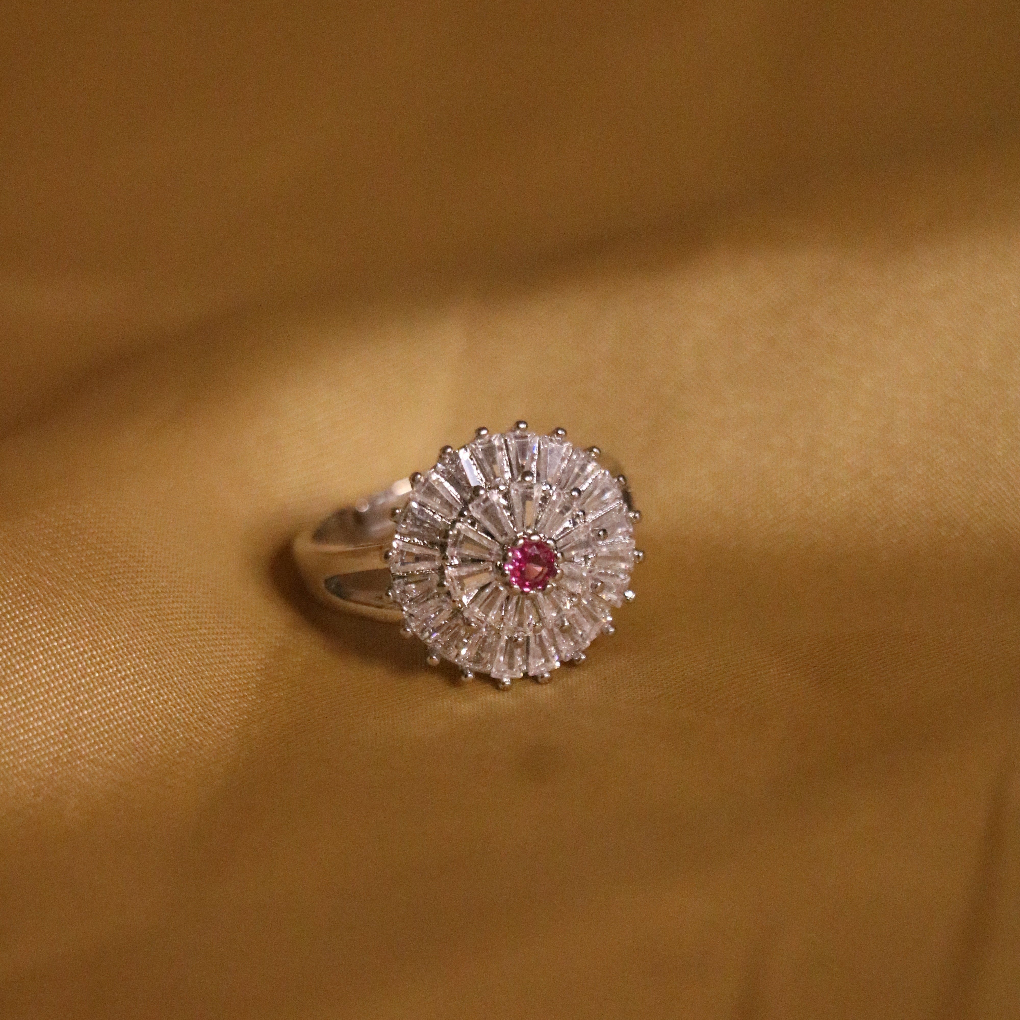 Radiant Gold-Plated Sunburst Ring with Red Center Stone for Women