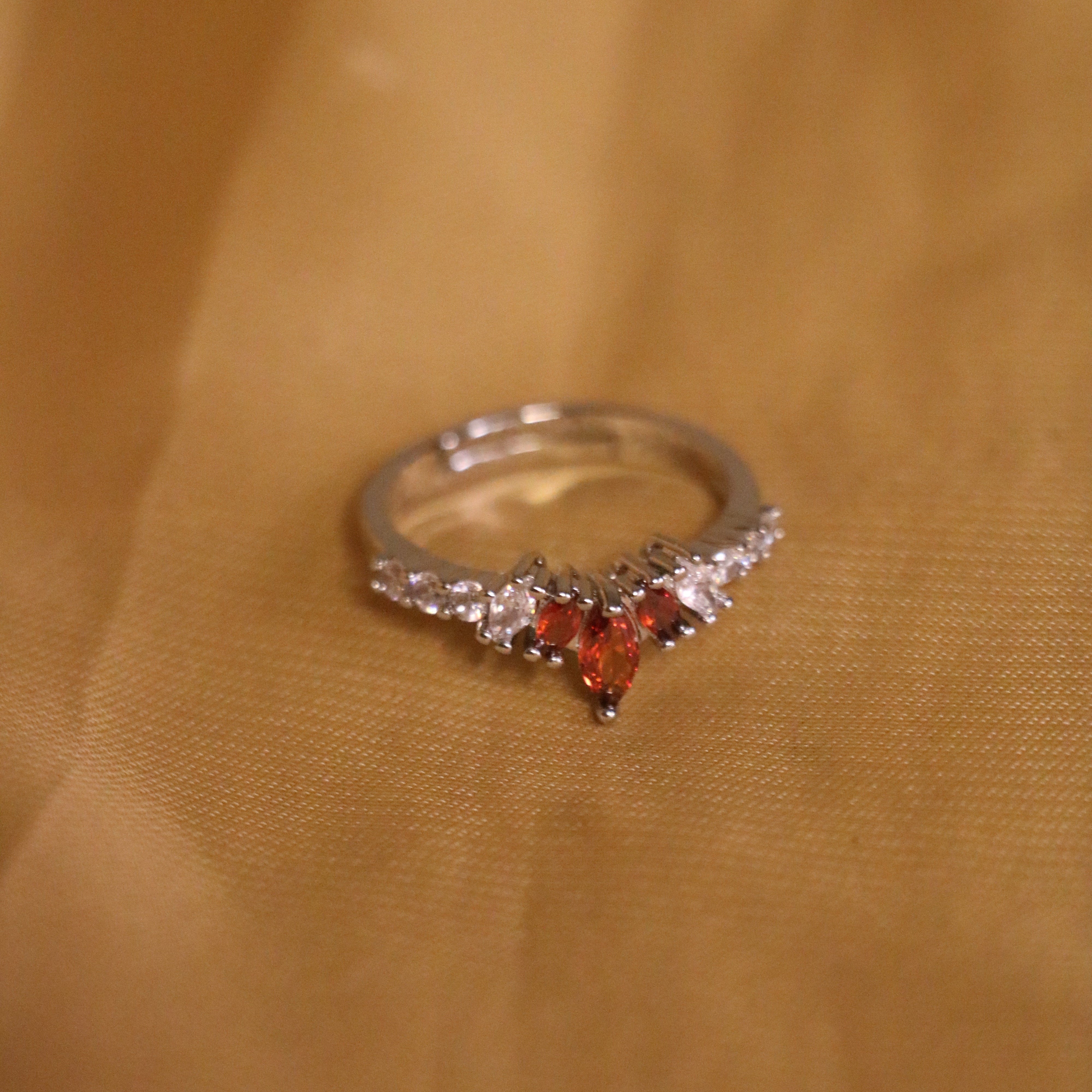Royal Elegance: Silver Crown Ring with Radiant Red Gemstone