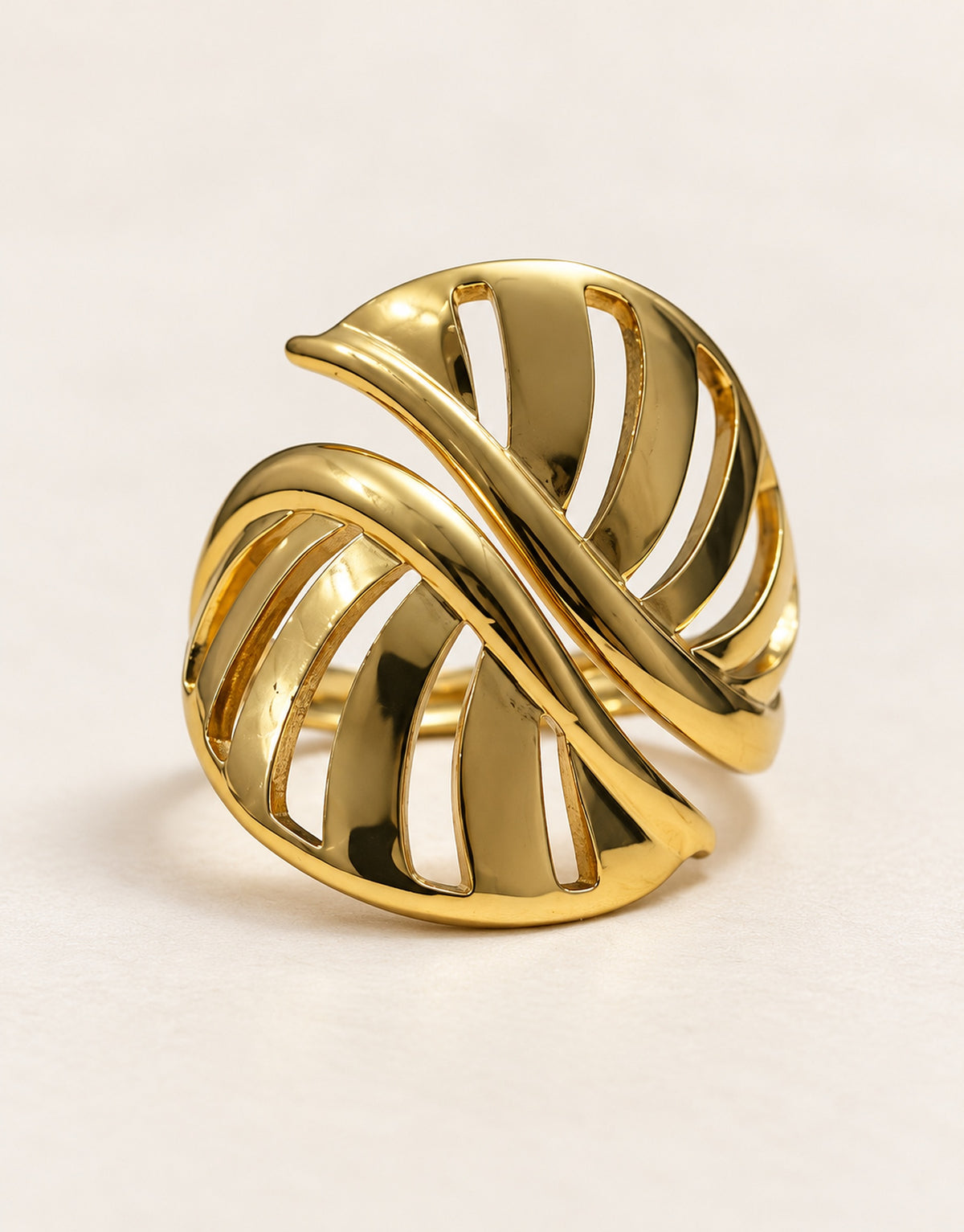 Orneza Gold-Tone Cutout Crossover Dome Ring — detail view