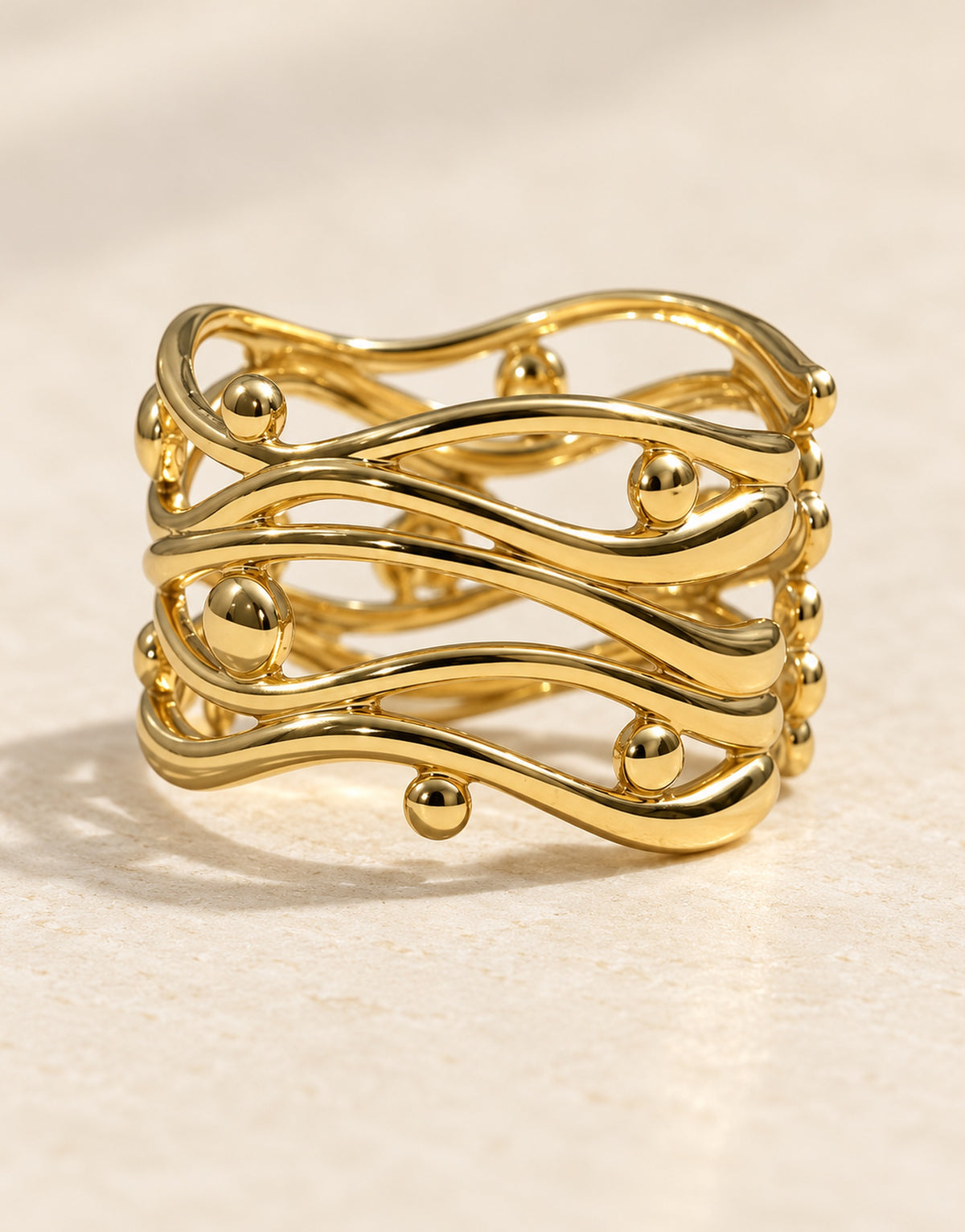 Orneza Gold-Tone Wavy Lattice Wide Ring — detail view