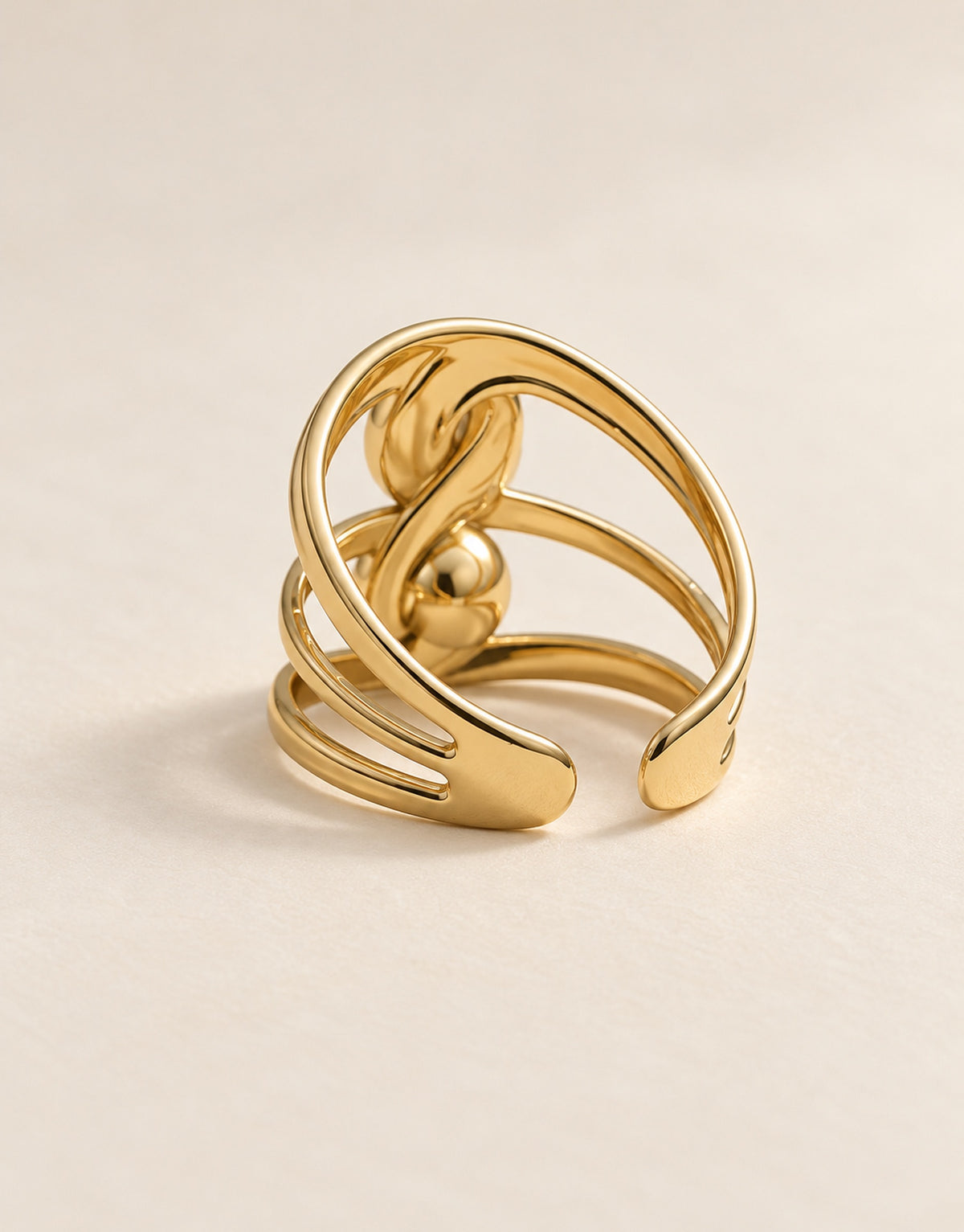 Orneza Gold-Tone Sculptural Orb Loop Ring — angle view