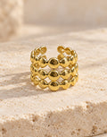 Orneza Gold-Tone Triple Row Disc Bead Ring — front view