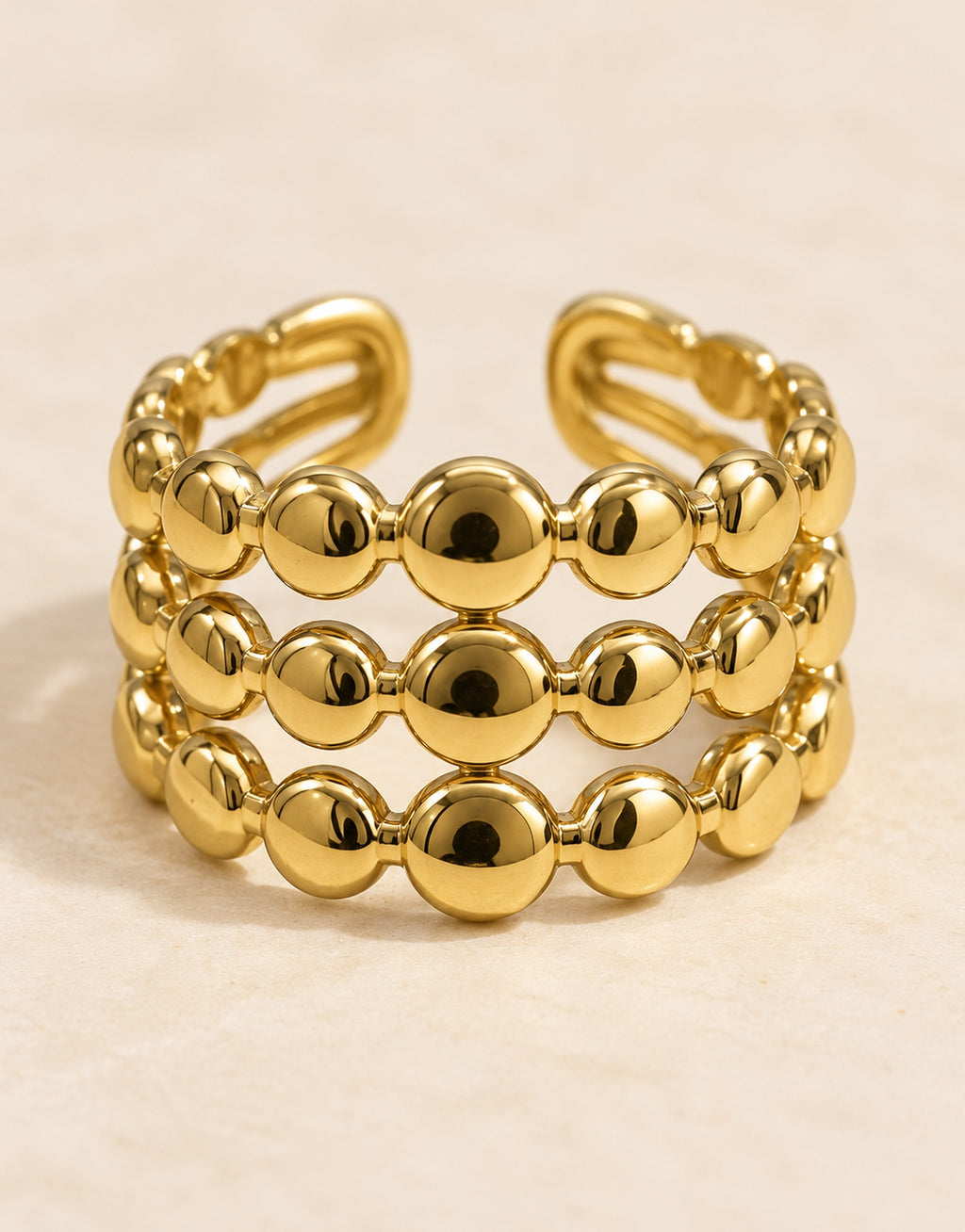 Orneza Gold-Tone Triple Row Disc Bead Ring — detail view