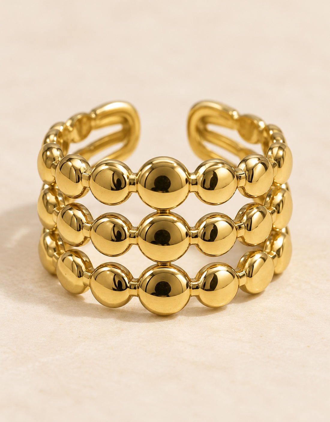 Orneza Gold-Tone Triple Row Disc Bead Ring — detail view