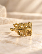 Orneza Gold-Tone Cutout Leaf Band Ring — angle view