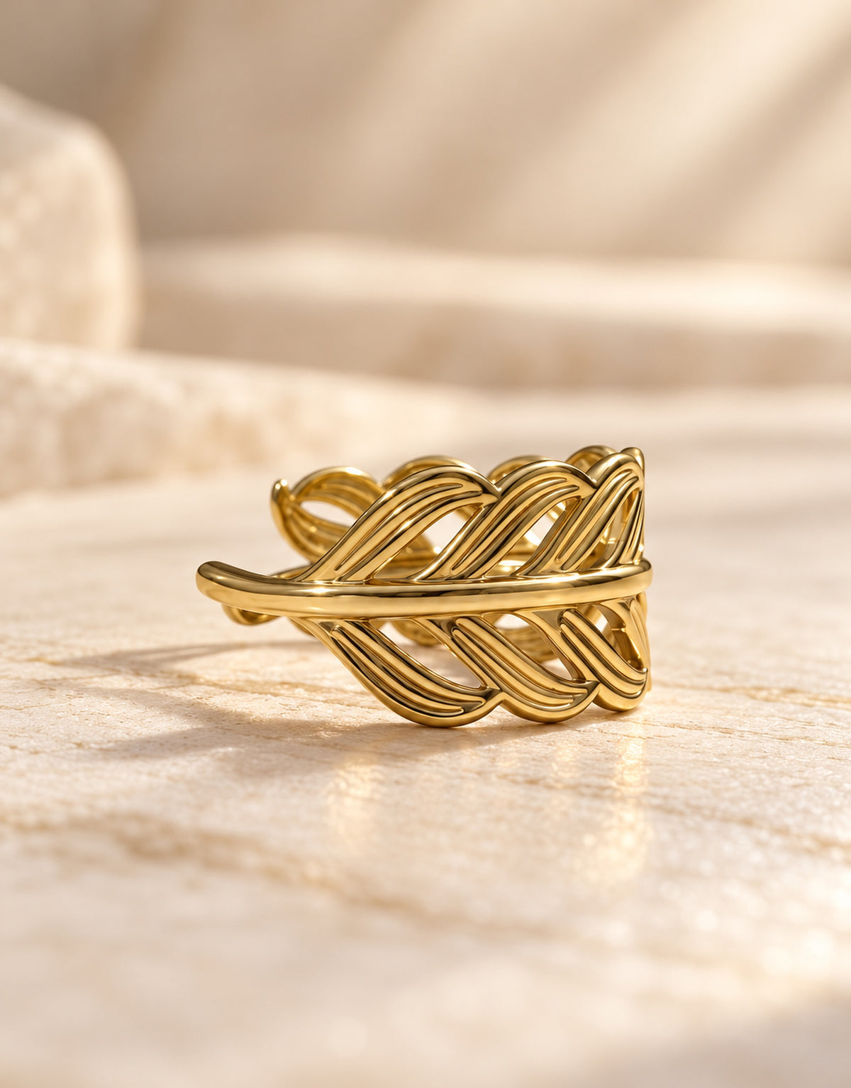 Orneza Gold-Tone Cutout Leaf Band Ring — angle view