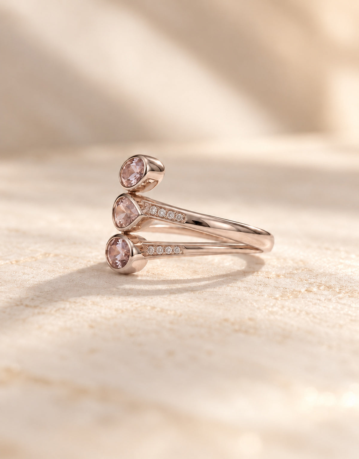 Orneza Rose-Gold-Tone Three Pink Stone Ring — angle view