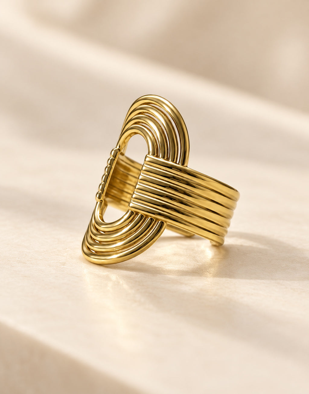 Orneza Gold-Tone Ribbed Open Oval Ring — angle view