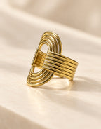 Orneza Gold-Tone Ribbed Open Oval Ring — angle view
