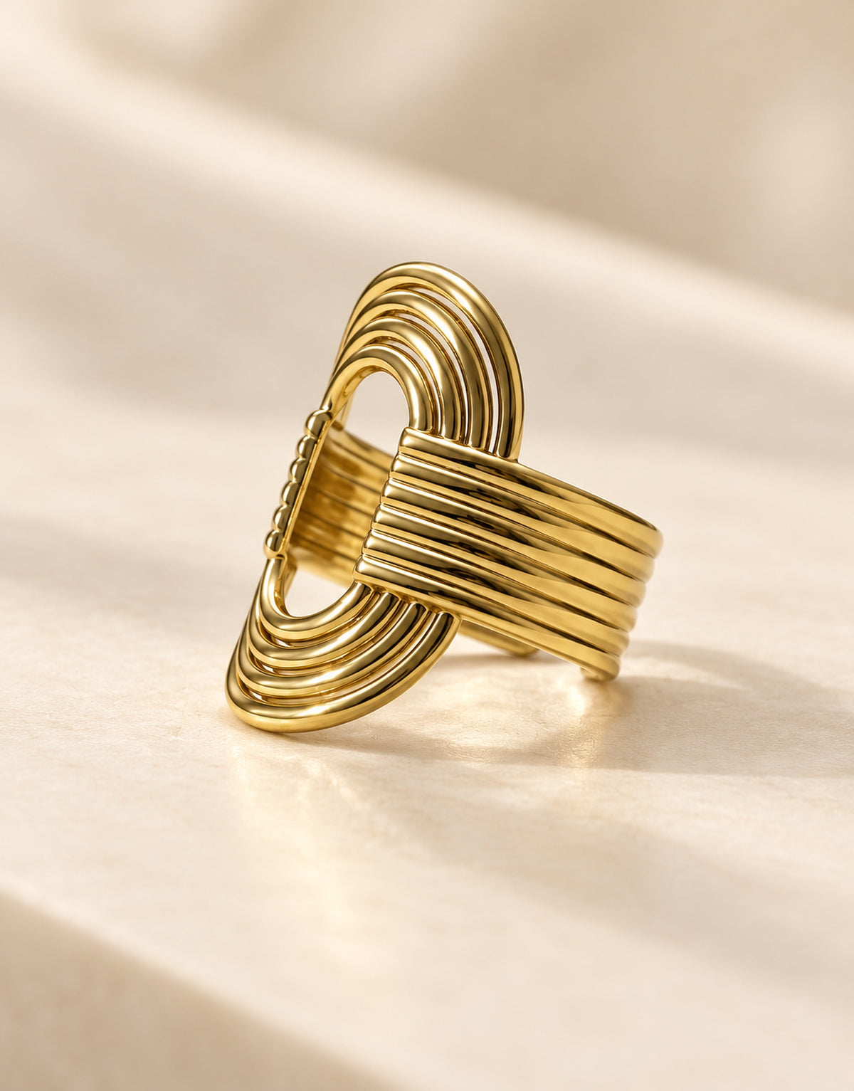 Orneza Gold-Tone Ribbed Open Oval Ring — angle view